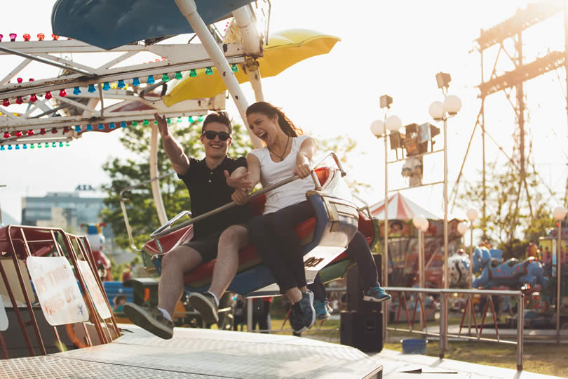 Couple on a ride UK fairground